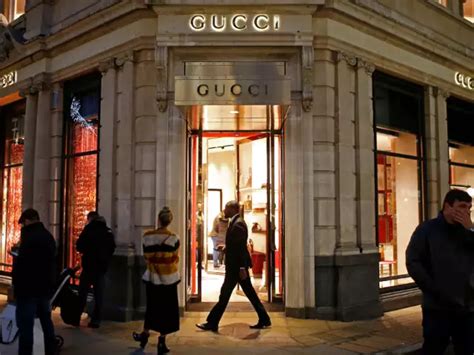 who owns gucci and balenciaga